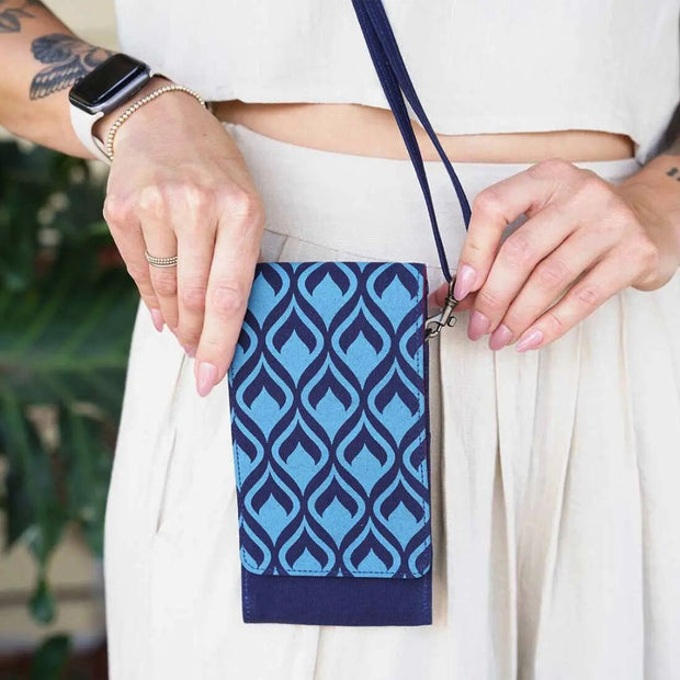 Crossbody Phone Case Wallet in Geometric Navy screen printed design on model
