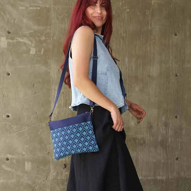 Screen Print Small Crossbody Bag with Geometric Navy print on a model