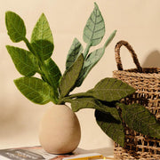 Various shades of green Felt Ash Leaf Stems in a vase
