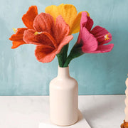 A bouquet of various Felt Hibiscus Flower Stems in a vase