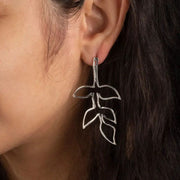 Silver Tone Fauna Brass Wire Post Earrings on model