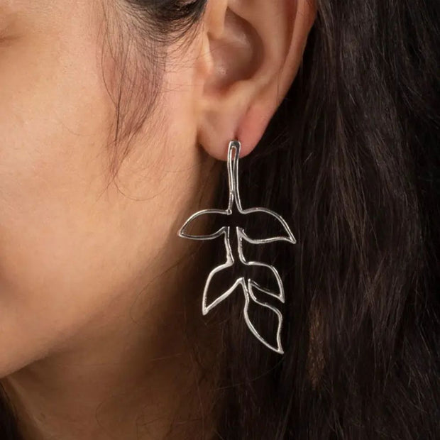 Silver Tone Fauna Brass Wire Post Earrings on model