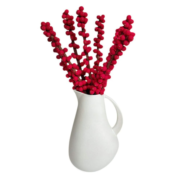Felt Red Winterberry Ilex Stems in a large ceramic pitcher