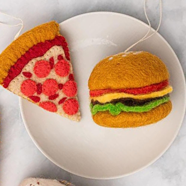 Felt Juicy Burger Ornament next to a Felt Slice of Pizza Ornament