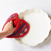 Handwoven Festive Red Heart Shaped Pot Holder in use