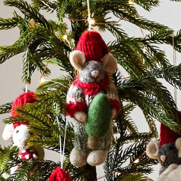 Gry and Sif Handmade Felt Grey Mouse with red hat and knitted sweater Ornament holding a tine Christmas Tree with festive background