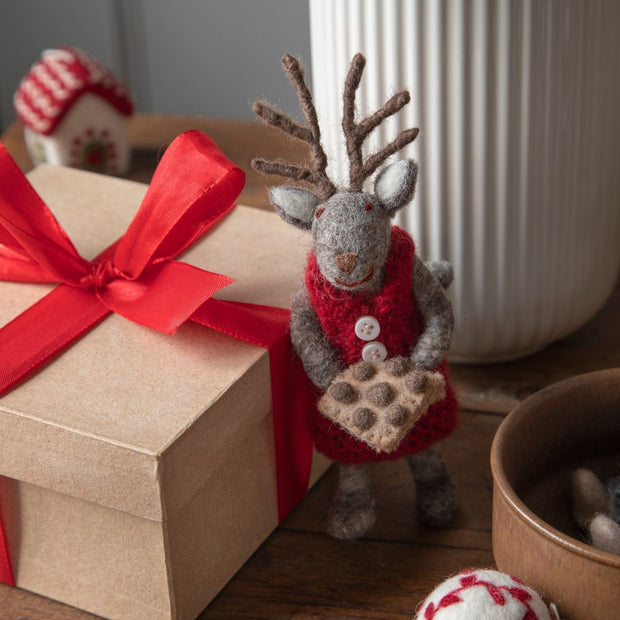 Felt Grey Deer Ornament holding a Baking Tray styled