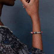 Person wearing a Heishi Disc Bead Bracelet 