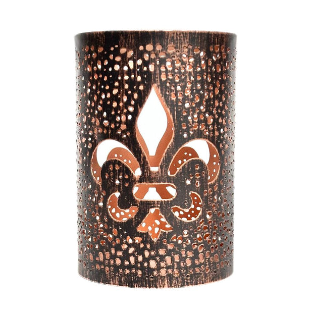 Decorative candle holder with a fleur-de-lis design