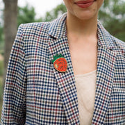 Beaded Brooch Pin - Strawberry on model wearing a blazer