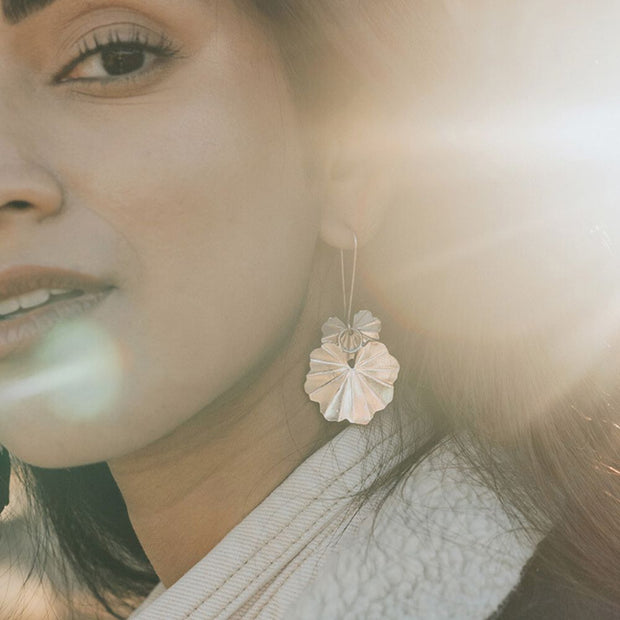 Sayuri Silver Tone Ginkgo Leaf Dangle Earrings on model