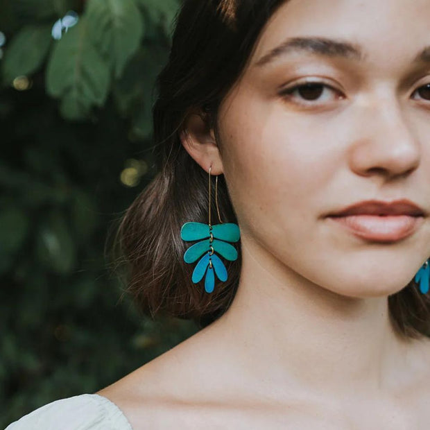Chameli Teal Patina Dangling Leaf Earrings on model