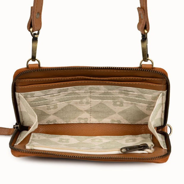 JOYN Crossbody Wallet in Camel Pebbled Leather showing interior detail