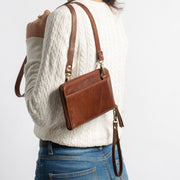 Crossbody Wallet in Brown Leather on a model