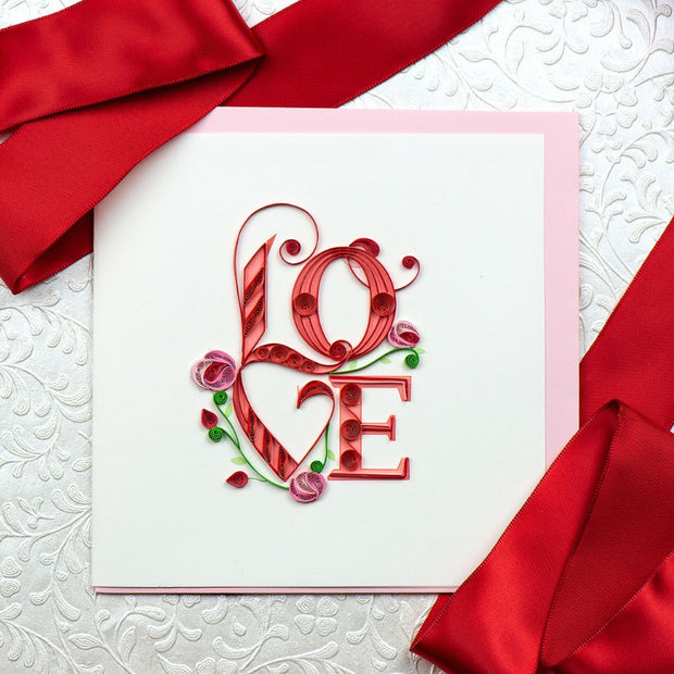Love Quilled Greeting Card styled with red ribbons for Valentine's Day