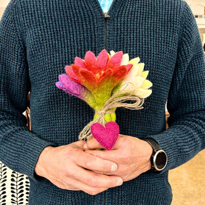 Maya Sweetheart Felt Flower Bouquet held by hand and showing token heart