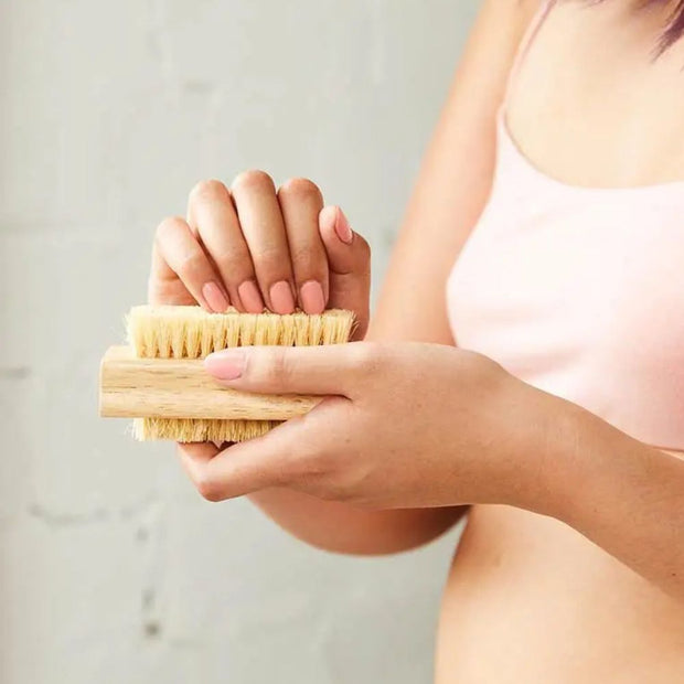 Person using a Natural Tampico Eco Max Premium Nail Brush