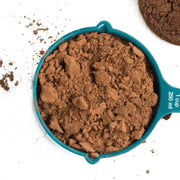 Organic Baking Cocoa Powder in bulk in a measuring cup