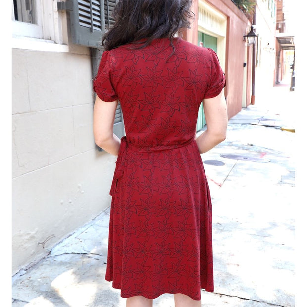 Passion Lilie Organic Cotton Cabernet Wrap Dress with pockets on model back view