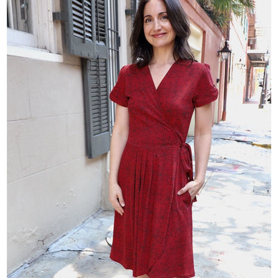 Passion Lilie Organic Cotton Cabernet Wrap Dress with pockets on model front view