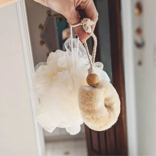 Person holding a Palm Body Eco Max Wash Brush made of Soft Jute