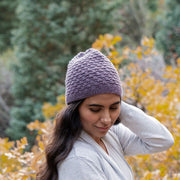 100% alpaca yarn hand-knitted Inca Beanie - Lilac on model