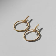 Rover & Kin Luxe Brass Outline Earrings flat