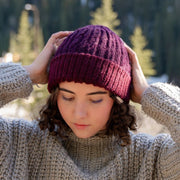 Reversible Hand-knit Cable Hat - Berry on female model
