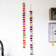 Two 3.5 foot long Festival Elephants Hanging Garlands shown on a white wall