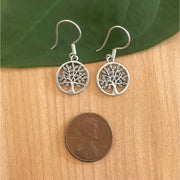 Petite Tree of Life Sterling Silver Earrings next a penny coin for size