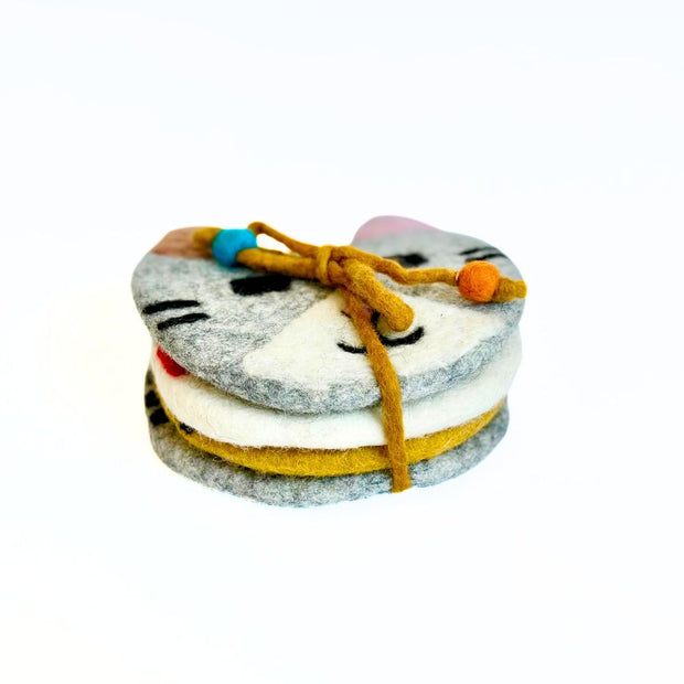 Set of four Felt Cat Coasters shown with tie