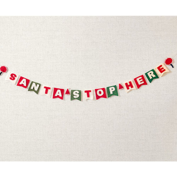 Santa Stop Here Felt Garland on cream background