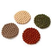 Set of Four Felt Ball Coasters in Solid complementary colors: forest green, rust, brown and cream