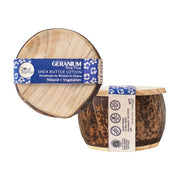 Skin Care Shea Butter Lotion: Geranium Ylang Ylang in a coconut container showing labels