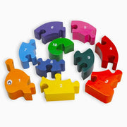 Separate pieces of the Wooden Snail Jigsaw Puzzle showing numbers 1 to 10