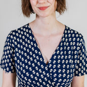 Mata Traders Katie Wrap Dress with Micro Floral Navy print on model close-up