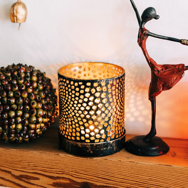 Mandala Design Iron Candleholder styled on mantel with other home decor