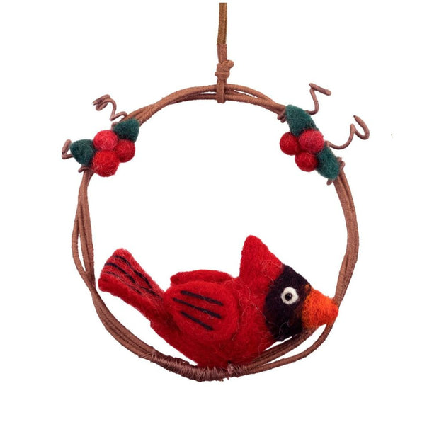 Cardinal nestling inside a miniature wreath