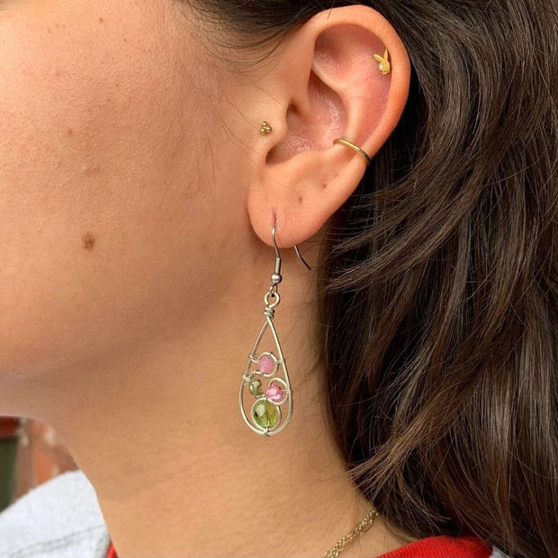 Crystal Swirl Teardrop Earrings on model