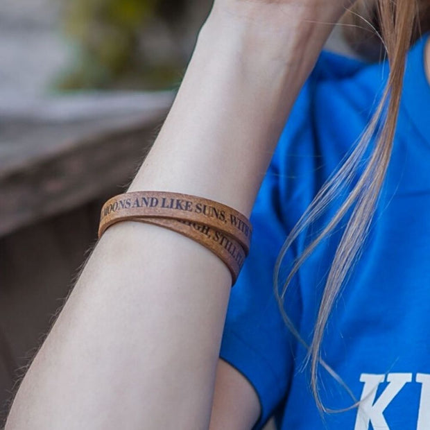 Double Wrap Recycled Leather Bracelet - Still I'll Rise quote by Maya Angelou on model