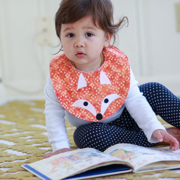 Cotton Batik Fox Applique Bib by Forai St Louis on child model