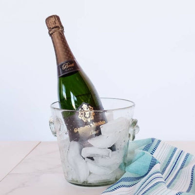 Fair Trade Hand Blown Glass Ice Bucket from Guatemala with bottle of bubbly