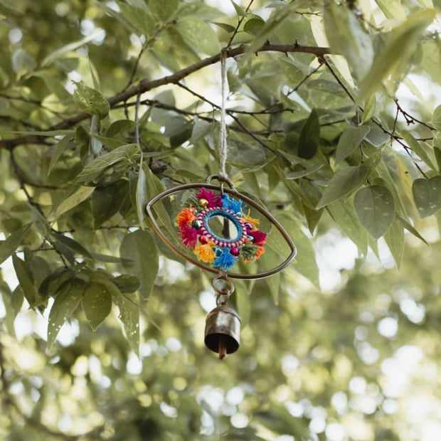 Nandini Bell Eye Chime with Rainbow Mirror outside
