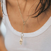 Ruchi Charm Drop Lariat Necklace - Bird and cubic zirconia on model