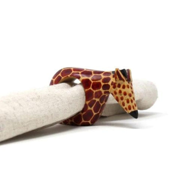 Mahogany Giraffe Napkin Ring shown with a napkin