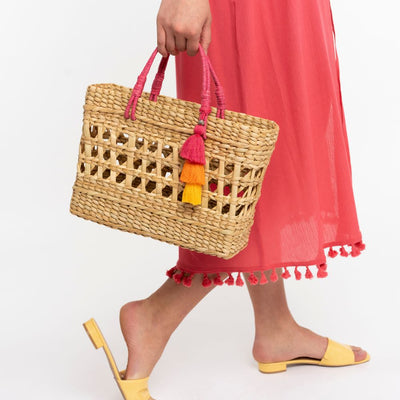Kingston Hand Woven Rattan Tote With Jute Handles carried by model