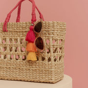 Kingston Hand Woven Rattan Tote With Jute Handles styled with sunglasses
