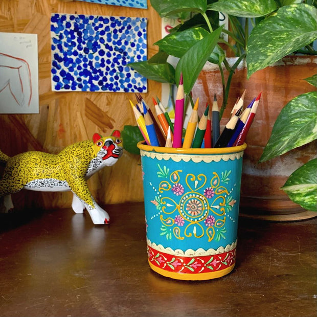 Hand-painted Henna Floral Metal Herb Planter shown as a pencil holder