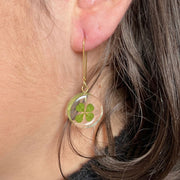 Resin Mini Moon Earrings with Four Leaf Clover on model