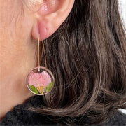 Resin Full Moon Earrings with Cherry Blossom Petals on model